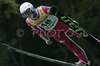 Winner Simon Ammann of Switzerland soars through the air during Summer FIS Grand Prix in ski jumping Kranj 2006. Summer FIS Grand Prix in ski jumping Kranj 2006 was held on 2. of September 2006 in Kranj, Slovenia.
