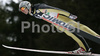 Wilhelm Denifl of Austria soars through the air during first jump of FIS Nordic Combined World Cup, which was held in Ramsau am Dachstein, Austria, on 17th of December 2006.
