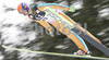 Maxime Laheurte of France soars through the air during first jump of FIS Nordic Combined World Cup, which was held in Ramsau am Dachstein, Austria, on 17th of December 2006.

