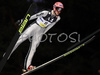 Andrea Morassi of Italy soars through the air during FIS Ski jumping World Cup race in Villach, Austria. First of two ski jumping World Cup races in Villach, Austria was held on 13th of December 2007, as substitute race for canceled race in Kranj, Slovenia
