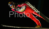  soars through the air during second race of FIS Ski jumping World Cup in Villach, Austria. FIS Ski jumping World Cup race was held in Villach, Austria, on 14th of December 2007.
