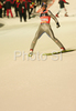 Winner Thomas Morgenstern of Austria celebrates his success after second jump in second race of FIS Ski jumping World Cup in Villach, Austria. FIS Ski jumping World Cup race was held in Villach, Austria, on 14th of December 2007.
