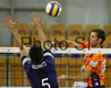 Scott Joseph Touzinsky (no.7) of ACH Volley (R) and Rafael Redwitz (no.5) of Paris Volley (L) during match of 3rd round of Indesit European Champions League between ACH Volley, Bled, Slovenia and Paris Volley, France. Match was played in Tivoli arena, Ljublja <br> na, Slovenia on 12th of December 2007.  <br> 
