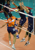 Mitja Gasparini (no.6) of ACH Volley (L) spikes while Romain Vadeleux (no.9) of Paris Volley (M) and Jiri Novak (no.10) of Paris Volley (R) block his spike during match of 3rd round of Indesit European Champions League between ACH Volley, Bled, Slovenia and Paris Volley, France. Match was played in Tivoli arena, Ljubljana, Slovenia on 12th of December 2007. 

