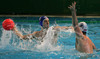 Erik Bukovac of Slovenia (R) is trying to hinder Frederic Audon of France (L) while hes shooting on goal  during first match of qualification waterpolo tournament for European championship. Match between Slovenia and France took place in Kranj, Slovenia on 7.April 2006. Slovenia defeated France with 9:7.
