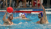 Matej Nastran of Slovenia (L) and Yann Vergeade of France (R) during first match of qualification waterpolo tournament for European championship. Match between Slovenia and France took place in Kranj, Slovenia on 7.April 2006. Slovenia defeated France with 9:7.
