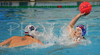 Aurelien Cousin of France (R) and Jure Nastran of Slovenia (L) fighting for ball during first match of qualification waterpolo tournament for European championship. Match between Slovenia and France took place in Kranj, Slovenia on 7.April 2006. Slovenia defeated France with 9:7.
