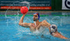 Jure Nastran of Slovenia (R) is trying to hinder Yann Vergeade of France (L) during first match of qualification waterpolo tournament for European championship. Match between Slovenia and France took place in Kranj, Slovenia on 7.April 2006. Slovenia defeated France with 9:7.
