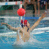 Remi Garseau of France is trying to save his goal after shoot during first match of qualification waterpolo tournament for European championship. Match between Slovenia and France took place in Kranj, Slovenia on 7.April 2006. Slovenia defeated France with 9:7.
