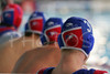 Reserve players of France (front is Yann Clay of France ) are observing match  of qualification waterpolo tournament for European championship between France and Slovakia. Match between France and Slovakia  took place in Kranj, Slovenia on 8.April 2006. Slovakia defeated France with 11-10.
