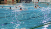Players of Slovenia (white caps) and Malta (blue caps) during match between Slovenia and Malta of qualification waterpolo tournament for European championship. Match between Slovenia and Malta took place in Kranj, Slovenia on 8.April 2006. Slovenia defeated Malta with 10-6. (Photo illustration)
