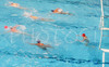 Players of Slovenia (white caps) and Malta (blue caps) during match between Slovenia and Malta of qualification waterpolo tournament for European championship. Match between Slovenia and Malta took place in Kranj, Slovenia on 8.April 2006. Slovenia defeated Malta with 10-6.
