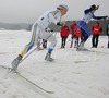 Fredrik Uusitalo of Sweden (L) and Matias Strandvall of Finland (R) skiing during Under-23 Men finals of FIS Nordic Junior Ski World Championship sprint race were held in Medvode, Slovenia.  Race was won by Harald Wurm of Austria, Josef Wenzl of Germany placed second, Marcus Hellner of Sweden finished third, while Oeystein Pettersen of Norway finished fourth.
