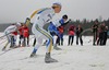 Fredrik Uusitalo of Sweden (L) and Matias Strandvall of Finland (R) skiing during Under-23 Men finals of FIS Nordic Junior Ski World Championship sprint race were held in Medvode, Slovenia.  Race was won by Harald Wurm of Austria, Josef Wenzl of Germany placed second, Marcus Hellner of Sweden finished third, while Oeystein Pettersen of Norway finished fourth.
