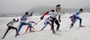 Martin Stockinger of Austria (L) and Kalle Lassila of Finland (R) leading pack during Under-23 Men finals of FIS Nordic Junior Ski World Championship sprint race were held in Medvode, Slovenia.  Race was won by Harald Wurm of Austria, Josef Wenzl of Germany placed second, Marcus Hellner of Sweden finished third, while Oeystein Pettersen of Norway finished fourth.

