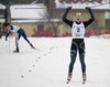 Winner Guro Stroem Solli of Norway celebrating her victory, while second placed Valentina Novikova of Russia getting up after her fall in last 20 meters of Under-23 Women finals of FIS Nordic Junior Ski World Championship sprint race were held in Medvode, Slovenia.  Race was won by Guro Stroem Solli of Norway, Valentina Novikova of Russia placed second, Nicole Fessel of Germany placed third, while Petra Markelova of Czech finished fourth.
