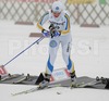 Charlotte Kalla of Sweden changing from classic to skating skis during Junior Women FIS Nordic Junior Ski World Championships 5+5km pursuit race which was held in Medvode,  Slovenia.
