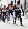 Second placed Illia Chernousov of Russia (No.29) and third placed Martin Jaks of Czech (No.3) skiing during Junior Men FIS Nordic Junior Ski World Championships 10+10km pursuit race which was held in Medvode,  Slovenia.
