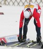 Winner Petter Northug of Norway changing his classic skis to his skating skis during Junior Men FIS Nordic Junior Ski World Championships 10+10km pursuit race which was held in Medvode,  Slovenia.
