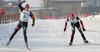 Tom Beetz of Austria (L) celebrating victory of Germany Nordic combined team, after he outsprinted Alfred Rainer of Austria (R) in Junior Nordic Combined Ski World Championship Team race. Race was won by Germany, Austria placed second and Norway finished third.
