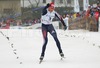 Winner Alexander Legkov of Russia celebrating his victory while skiing to finish line of  Under-23 Men FIS Nordic Junior Ski World Championships 15+15km pursuit race which was held in Medvode,  Slovenia.
