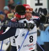 Winner Alexander Legkov of Russia (R) and his teammate Sergej Shiriaev celebrating theor first and second place in Under-23 Men FIS Nordic Junior Ski World Championships 15+15km pursuit race which was held in Medvode,  Slovenia.

