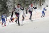 Winner Alexander Legkov of Russia (R) and his teammate second placed Sergej Shiriaev (L) skiing during Under-23 Men FIS Nordic Junior Ski World Championships 15+15km pursuit race which was held in Medvode,  Slovenia.
