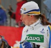 Fourth placed Maria Rydqvist of Sweden resting after Under-23 Women FIS Nordic Junior Ski World Championships 7.5+7.5km pursuit race which was held in Medvode,  Slovenia.
