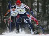 Andrey Parfenov of Russia leading pack in third leg of Junior Men FIS Nordic Junior Ski World Championships 4x5km relay race which was held in Medvode,  Slovenia. Race was won by Norway, Russia placed second, while relay of Czech finished third.
