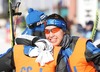 Two members of Finnish relay team celebrating their fourth place in  Junior Women FIS Nordic Junior Ski World Championships 4x3.3km relay race which was held in Medvode,  Slovenia. Race was won by Norway, Sweden placed second, while Russia finished third.
