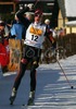 Winner Tom Beetz is celebrating his gold medal while skiing last meters of Junior Nordic Combined sprint race of FIS Nordic Junior Ski World Championships which was held in Medvode, Slovenia on 5.February 2006.
