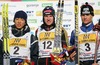 Winner Tom Beetz of Germany (M), second placed Akito Watabe of Japan (L) and third placed Miroslav Dvorak of Czech (R) celebrating their medals in Junior Nordic Combined sprint race of FIS Nordic Junior Ski World Championships which was held in Medvode, Slovenia on 5.February 2006.
