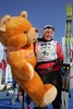Member of winning Norwegian team Ingunn Weltzien celebratin her gold medal with big bear after Junior Women FIS Nordic Junior Ski World Championships 4x3.3km relay race which was held in Medvode,  Slovenia. Race was won by Norway, Sweden placed second, while Russia finished third.
