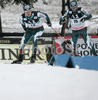 Ville Kaehkoenen of Finland (L) and  <br> Jaakko Tallus of Finland  (R) skiing during second race of FIS Nordic Combined World Cup in Ramsau. FIS Nordic Combined World Cup was held in Ramsau am Dachstein, Austria, on 17th of December 2006.
