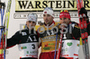 Winner Magnus-H. Moan of Norway (M), second placed Jason Lamy Chappuis of France (L) and third placed Ronny Ackermann of Germany (R) celebrating their medals after second race of FIS Nordic Combined World Cup in Ramsau. FIS Nordic Combined World Cup was held in Ramsau am Dachstein, Austria, on 17th of December 2006.
