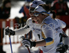 Winner Astrid Jacobsen of Norway (L) and second placed Charlotte Kalla of Sweden (R) celebrating after finals of Women Sprint race of Junior Nordic skiing World Championships in Tarvisio, Italy. Women Sprint race of Junior Nordic skiing World Championships in Tarvisio, Italy was held on 12th of March 2007 in Fusine, Italy. Due warm weather and lack of snow, cross country skiing races of Junior Nordic skiing World Championships 2007 were moved from Tarvisio, Italy to Fusine, Italy.
