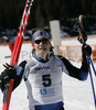 Second placed Martti Jylhae of Finland celebrating his silver medal after finals of Men Sprint race of Junior Nordic skiing World Championships in Tarvisio, Italy. Men Sprint race of Junior Nordic skiing World Championships in Tarvisio, Italy was held on 12th of March 2007 in Fusine, Italy. Due warm weather and lack of snow, cross country skiing races of Junior Nordic skiing World Championships 2007 were moved from Tarvisio, Italy to Fusine, Italy.
