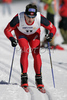 Anders Gloersen of Norway skiing in qualifications for Men Under23 Sprint race of Junior Nordic skiing World Championships in Tarvisio, Italy. Qualifications for Men Sprint race of Junior Nordic skiing World Championships in Tarvisio, Italy were held on 13th of March 2007 in Fusine, Italy. Due warm weather and lack of snow, cross country skiing races of Junior Nordic skiing World Championships 2007 were moved from Tarvisio, Italy to Fusine, Italy.
