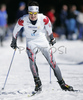Third placed Alex Harvey of Canada skiing in Men 10km freestyle race of Junior Nordic skiing World Championships in Tarvisio, Italy. Men 10km freestyle race of Junior Nordic skiing World Championships in Tarvisio, Italy was held on 14th of March 2007 in Fusine, Italy. Due warm weather and lack of snow, cross country skiing races of Junior Nordic skiing World Championships 2007 were moved from Tarvisio, Italy to Fusine, Italy.
