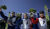 Winner Martti Jylhae of Finland (M), second placed Alexey Poltaranin of Kazahstan (L) and third placed Alex Harvey of Canada (R) celebrating their medals won in Men 10km freestyle race of Junior Nordic skiing World Championships in Tarvisio, Italy. Men 10km freestyle race of Junior Nordic skiing World Championships in Tarvisio, Italy was held on 14th of March 2007 in Fusine, Italy. Due warm weather and lack of snow, cross country skiing races of Junior Nordic skiing World Championships 2007 were moved from Tarvisio, Italy to Fusine, Italy.
