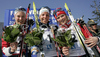 Winner Charlotte Kalla of Sweden (M), second placed Marte Monrad-Hansen of Norway (L) and third placed Therese Johaug of Norway (R) celebrating their medals won in Women 5+5km pursuit race of Junior Nordic skiing World Championships in Tarvisio, Italy. Women 5+5km pursuit race of Junior Nordic skiing World Championships in Tarvisio, Italy was held on 16th of March 2007 in Fusine, Italy. Due warm weather and lack of snow, cross country skiing races of Junior Nordic skiing World Championships 2007 were moved from Tarvisio, Italy to Fusine, Italy.

