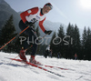 Matija Rimahazi of Slovenia skiing in Men 10+10km pursuit race of Junior Nordic skiing World Championships in Tarvisio, Italy. Men 10+10km pursuit race of Junior Nordic skiing World Championships in Tarvisio, Italy was held on 16th of March 2007 in Fusine, Italy. Due warm weather and lack of snow, cross country skiing races of Junior Nordic skiing World Championships 2007 were moved from Tarvisio, Italy to Fusine, Italy.
