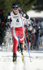 Winner Eirik Kurland Olsen of Norway skiing in Men 10+10km pursuit race of Junior Nordic skiing World Championships in Tarvisio, Italy. Men 10+10km pursuit race of Junior Nordic skiing World Championships in Tarvisio, Italy was held on 16th of March 2007 in Fusine, Italy. Due warm weather and lack of snow, cross country skiing races of Junior Nordic skiing World Championships 2007 were moved from Tarvisio, Italy to Fusine, Italy.
