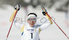 Winner Charlotte Kalla of Sweden celebrating her victory and World Champion title in Women 5+5km pursuit race of Junior Nordic skiing World Championships in Tarvisio, Italy. Women 5+5km pursuit race of Junior Nordic skiing World Championships in Tarvisio, Italy was held on 16th of March 2007 in Fusine, Italy. Due warm weather and lack of snow, cross country skiing races of Junior Nordic skiing World Championships 2007 were moved from Tarvisio, Italy to Fusine, Italy.
