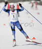 Winner Ioulia Tchekaleva of Russia celebrating her victory when crossing finish line in Women 7.5+7.5km pursuit race of Under23 Nordic skiing World Championships in Tarvisio, Italy. Women 7.5+7.5km pursuit race of Junior Nordic skiing World Championships in Tarvisio, Italy was held on 17th of March 2007 in Fusine, Italy. Due warm weather and lack of snow, cross country skiing races of Junior Nordic skiing World Championships 2007 were moved from Tarvisio, Italy to Fusine, Italy.
