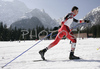 Winner Dario Cologna of Switzerland skiing in Men 15+15km pursuit race of Under23 Nordic skiing World Championships in Tarvisio, Italy. Men 15+15km pursuit race of Junior Nordic skiing World Championships in Tarvisio, Italy was held on 17th of March 2007 in Fusine, Italy. Due warm weather and lack of snow, cross country skiing races of Junior Nordic skiing World Championships 2007 were moved from Tarvisio, Italy to Fusine, Italy.
