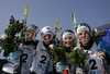 Girls of Swedish relay, Mia Eriksson, Eva Svensson, Anna Simberg and Charlotte Kalla celebrating their silver medal won in Women 4x3.3km relay race of Junior Nordic skiing World Championships in Tarvisio, Italy. Women 4x3.3km relay race of Junior Nordic skiing World Championships in Tarvisio, Italy was held on 18th of March 2007 in Fusine, Italy. Due warm weather and lack of snow, cross country skiing races of Junior Nordic skiing World Championships 2007 were moved from Tarvisio, Italy to Fusine, Italy.
