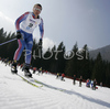 Evgeniy Garanichev of Russia skiing in Men 4x5km relay race of Junior Nordic skiing World Championships in Tarvisio, Italy. Men 4x5km relay race of Junior Nordic skiing World Championships in Tarvisio, Italy was held on 18th of March 2007 in Fusine, Italy. Due warm weather and lack of snow, cross country skiing races of Junior Nordic skiing World Championships 2007 were moved from Tarvisio, Italy to Fusine, Italy.
