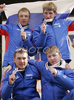 Second placed team of Russia with Ivan Ivanov, Dmitriy Vasiliev, Evgeniy Garanichev and Andrey Parfenov celebrating their medals won in Men 4x5km relay race of Junior Nordic skiing World Championships in Tarvisio, Italy. Men 4x5km relay race of Junior Nordic skiing World Championships in Tarvisio, Italy was held on 18th of March 2007 in Fusine, Italy. Due warm weather and lack of snow, cross country skiing races of Junior Nordic skiing World Championships 2007 were moved from Tarvisio, Italy to Fusine, Italy.
