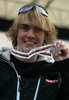Second placed Anssi Koivuranta of Finland celebrating his silver medal won in Nordic combined sprint race of Junior Nordic skiing World Championships in Tarvisio, Italy. Nordic combined sprint race of Junior Nordic skiing World Championships in Tarvisio, Italy was held on 18th of March 2007 in Fusine, Italy. Due warm weather and lack of snow, cross country skiing races of Junior Nordic skiing World Championships 2007 were moved from Tarvisio, Italy to Fusine, Italy.
